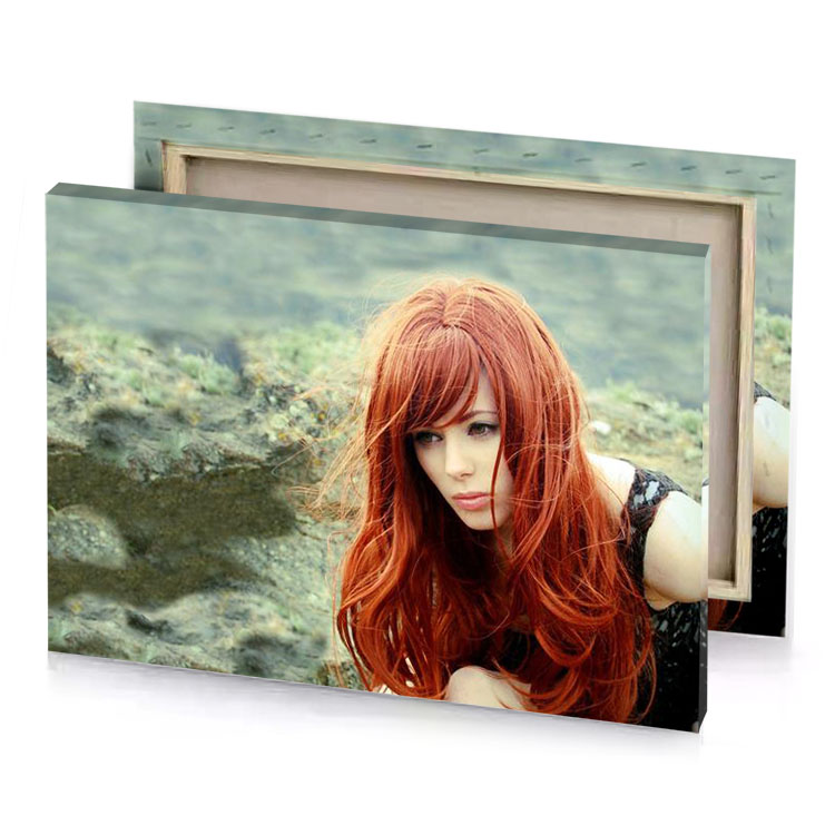 a woman with red hair is posing in the water dark gray canvas