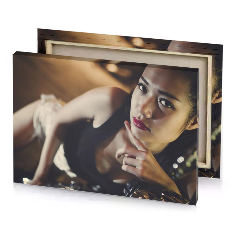 a woman with red lipstick and black dress taupe canvas