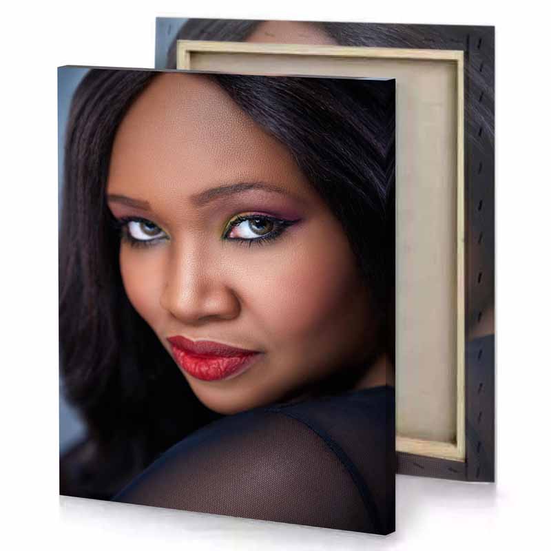 a woman with red lipstick and green eyes smoky black canvas