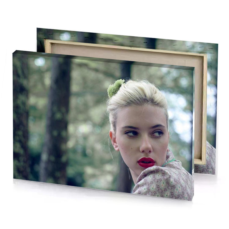 a woman with red lipstick and green flower in her manatee canvas