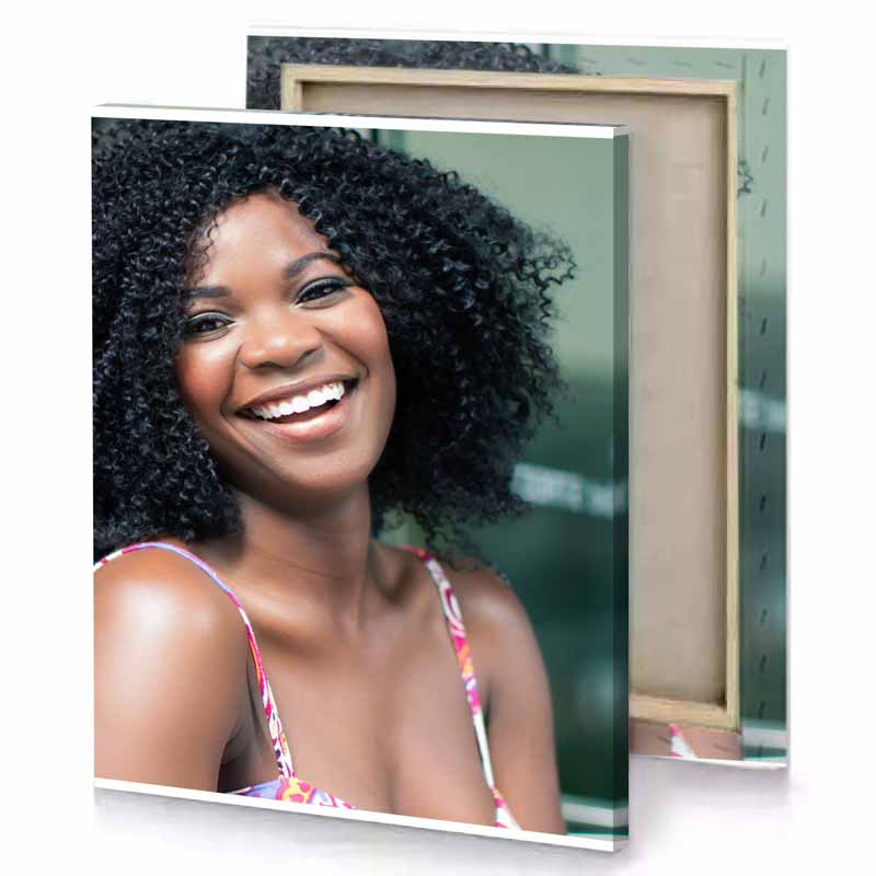 a woman with smile and big smoky black canvas