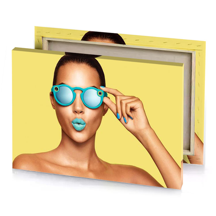 a woman with sunglasses on her face khaki canvas