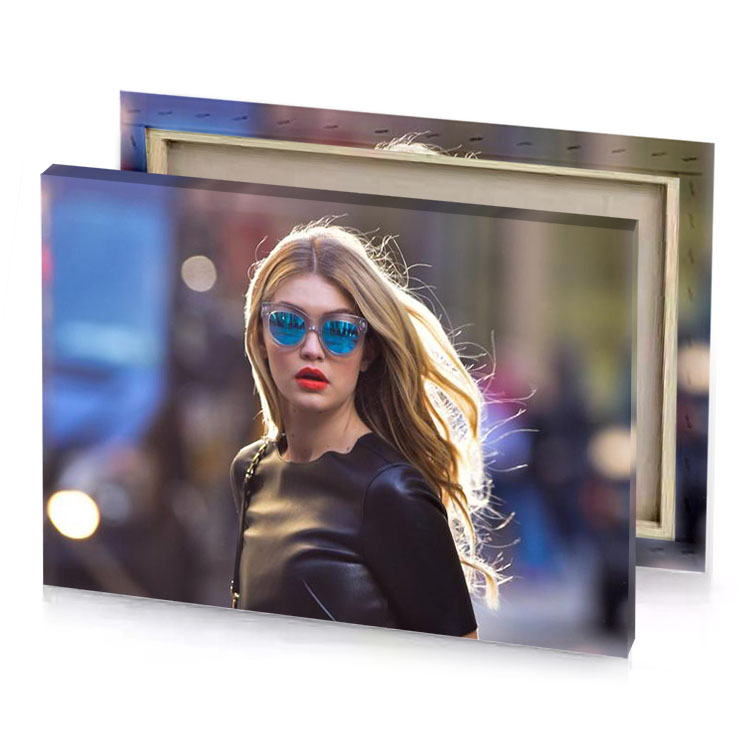a woman with sunglasses on walking down the street taupe canvas