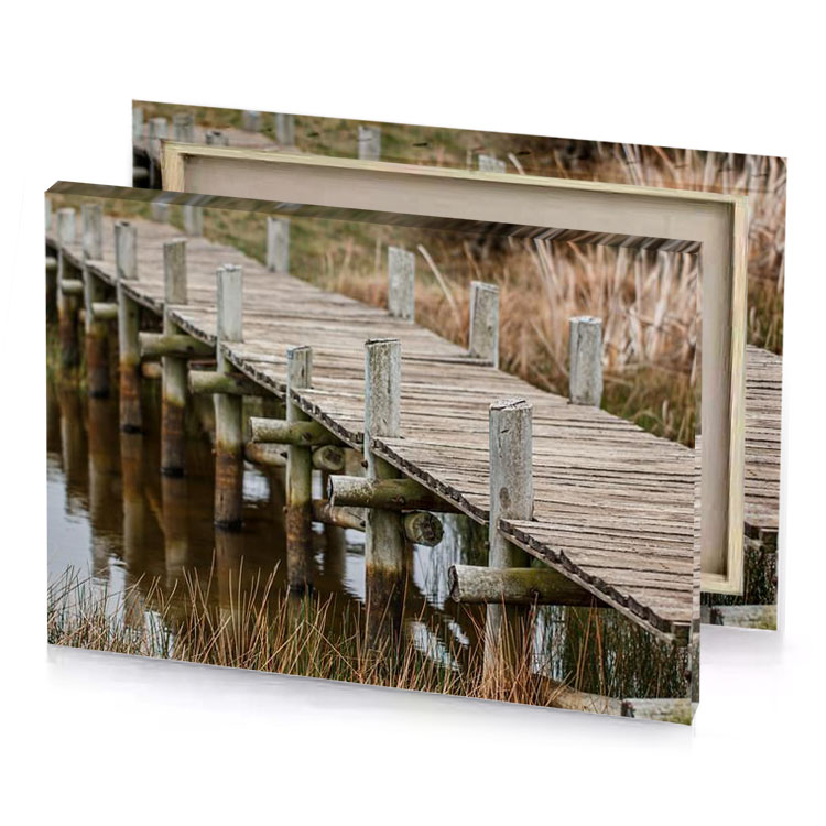 a wooden bridge over body of water zinnwaldite brown canvas