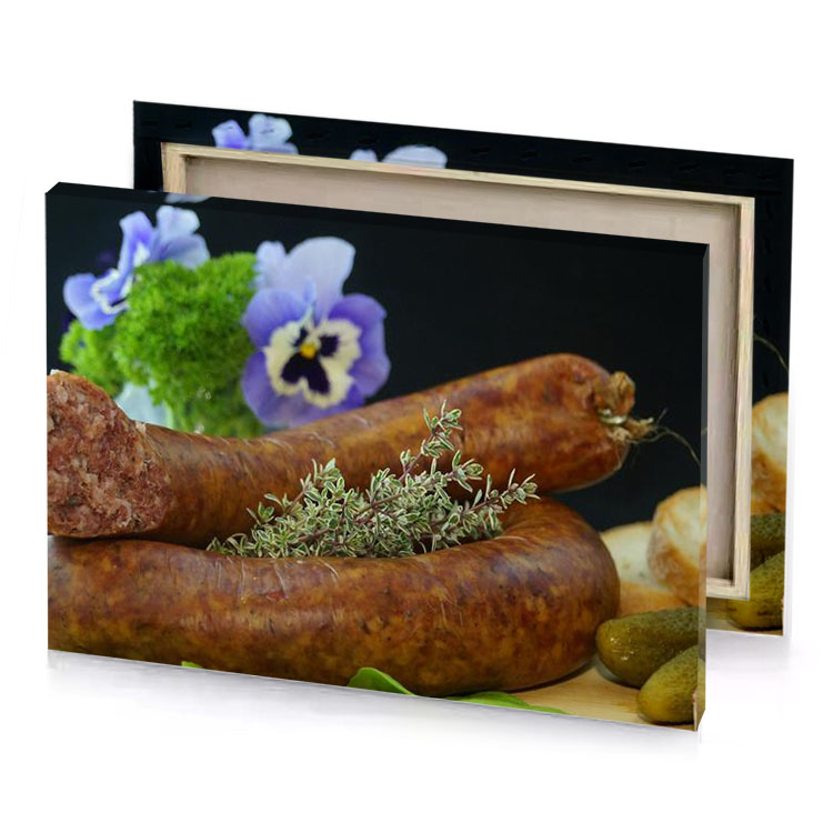 a wooden cutting board with sausages and vegetables sepia canvas