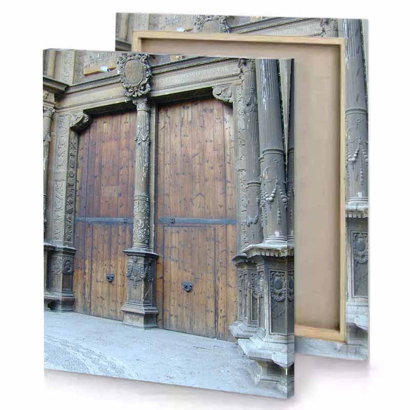 a wooden door with carvings on it rosy brown canvas