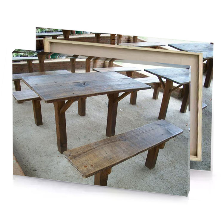 a wooden table with benches and on it manatee canvas
