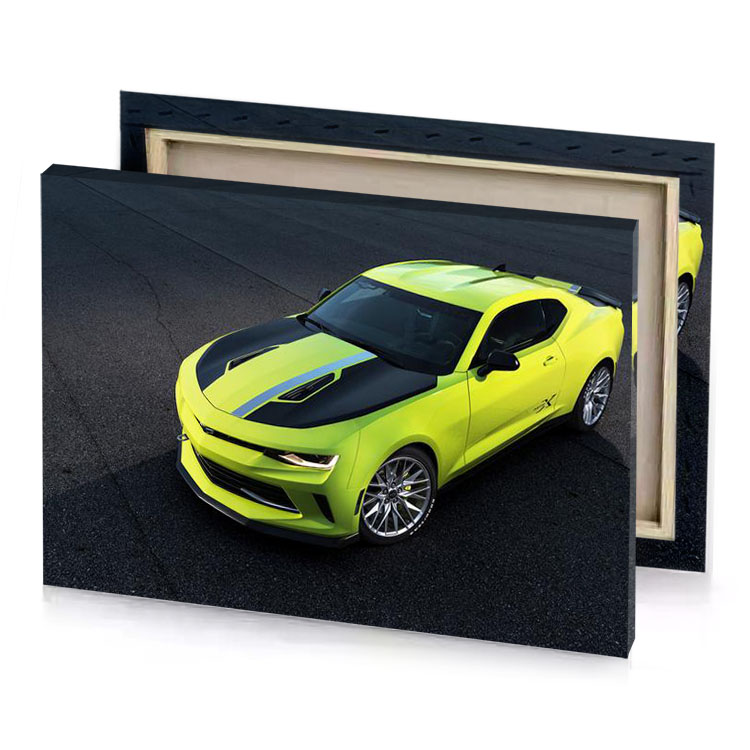 a yellow car parked in parking lot green canvas