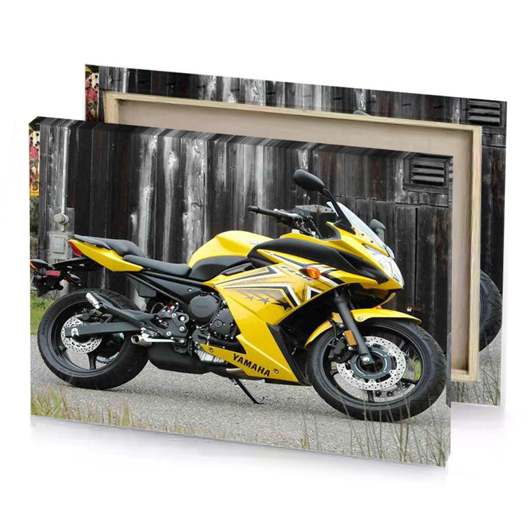 a yellow motorcycle parked in front of barn golden poppy canvas