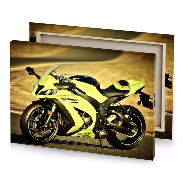 a yellow motorcycle parked on road next to hill khaki canvas