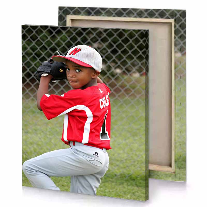 a young boy in baseball uniform holding glove dark khaki canvas