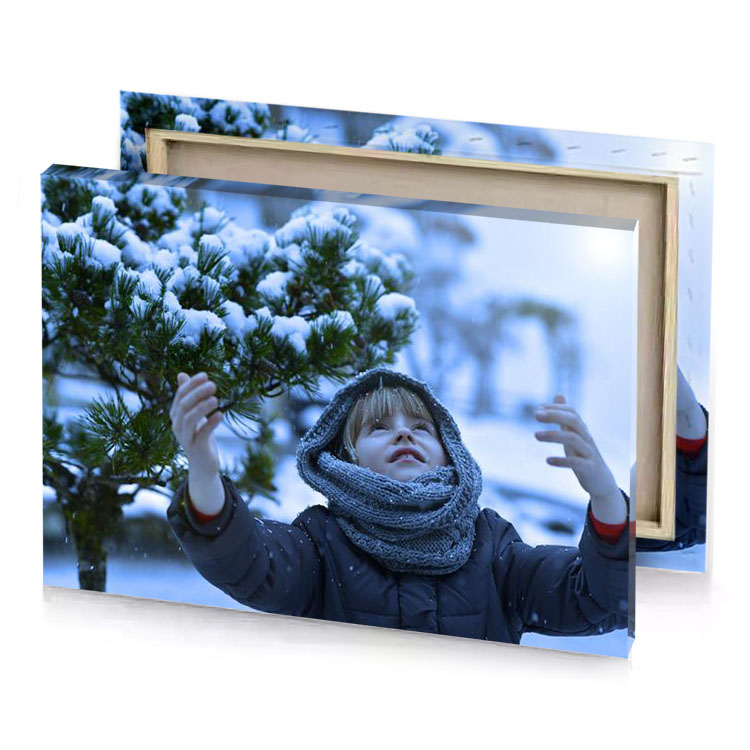 a young boy is standing in the snow dark slate blue canvas