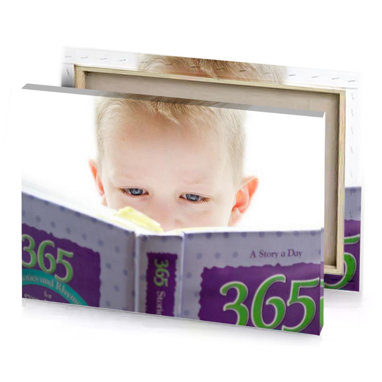 a young boy reading book with yellow bookmark apricot canvas