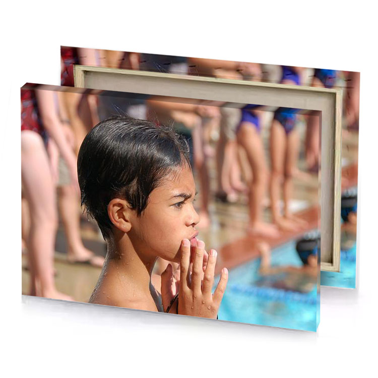a young boy standing in pool with his hands mouth sky blue canvas