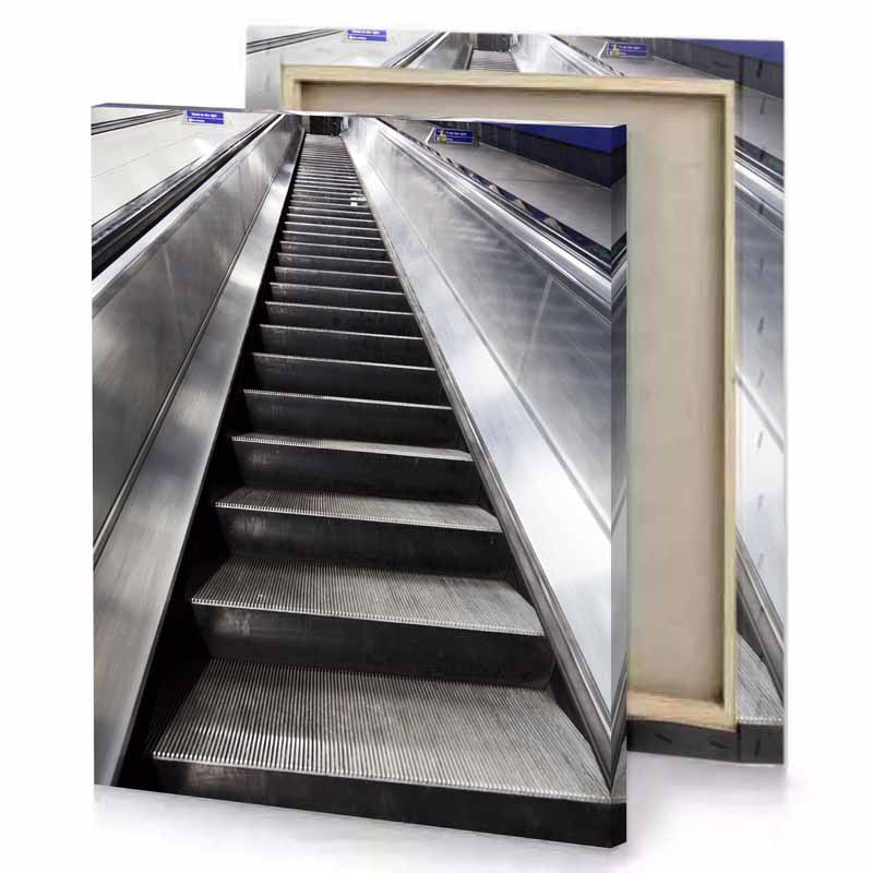 an escalator with a bunch of stairs smoky black canvas