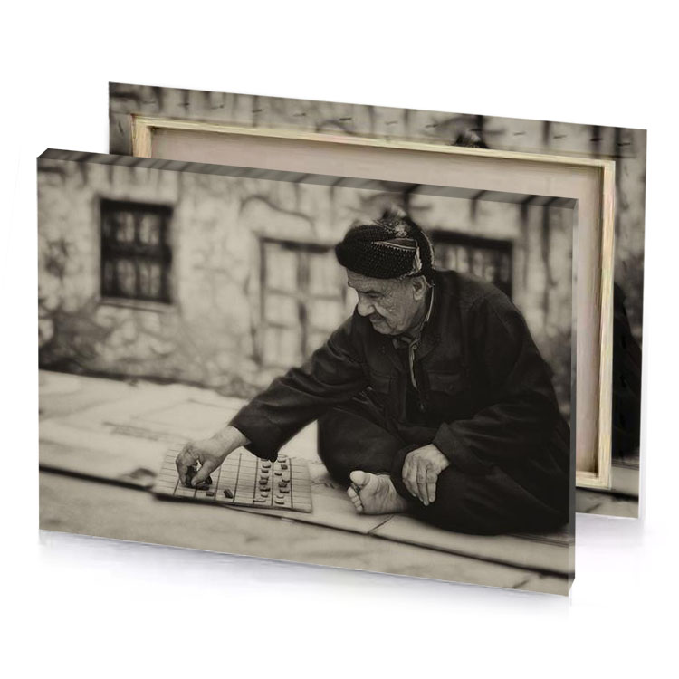 an old man playing a game of dominos zinnwaldite brown canvas