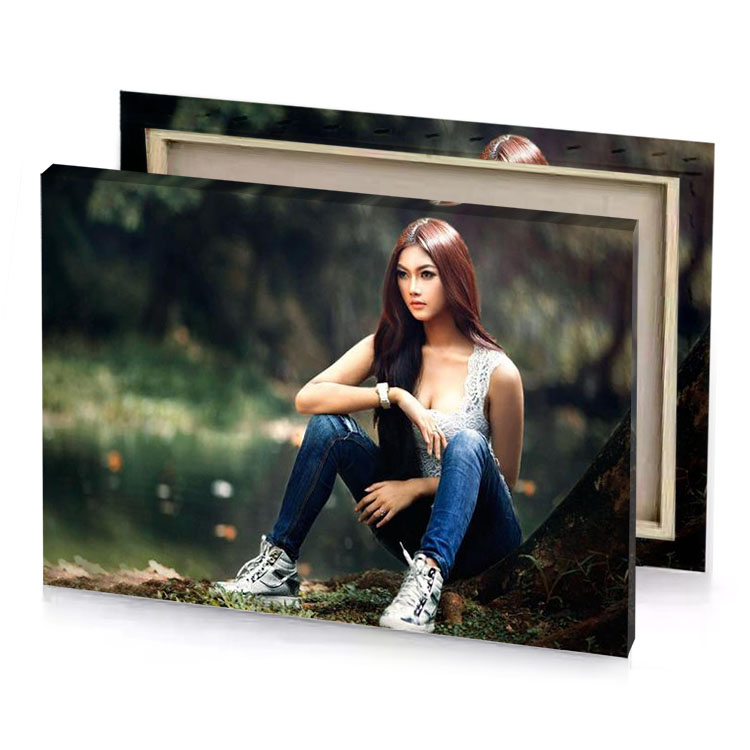 beautiful girl in jeans sitting on the ground smoky black canvas