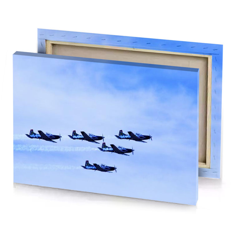four planes flying in formation prussian blue canvas
