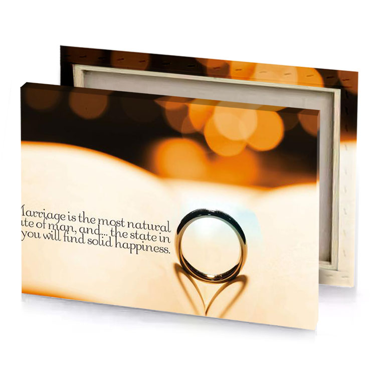 marriage ring on a book with blurred background tangerine canvas