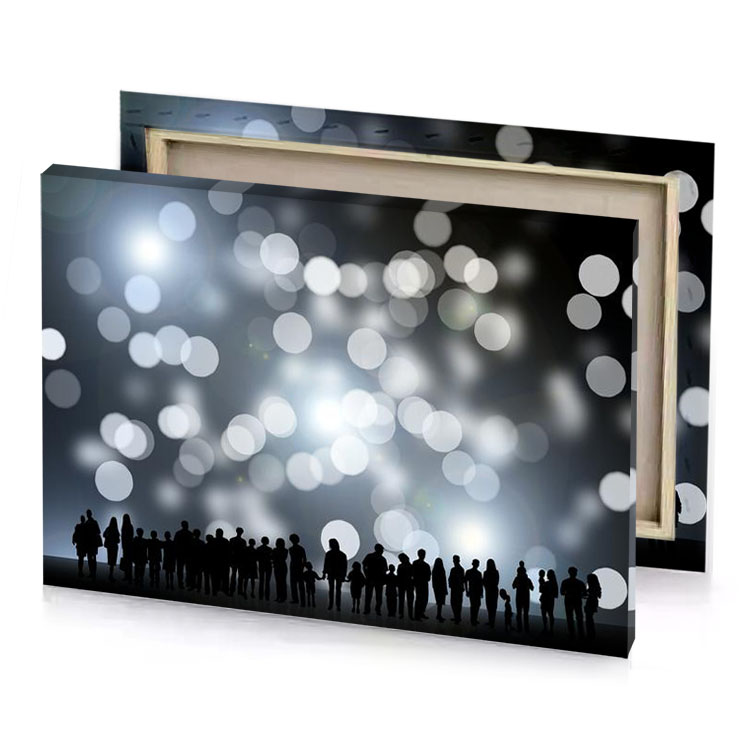 silhouettes of people standing in front a bright light silver canvas
