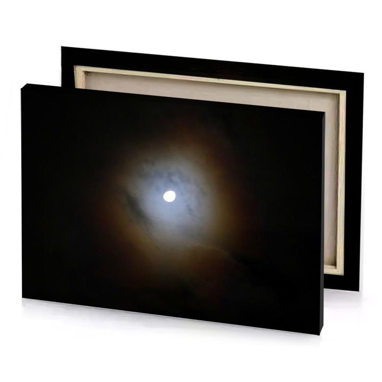the moon is seen through clouds in this image taken bistre canvas