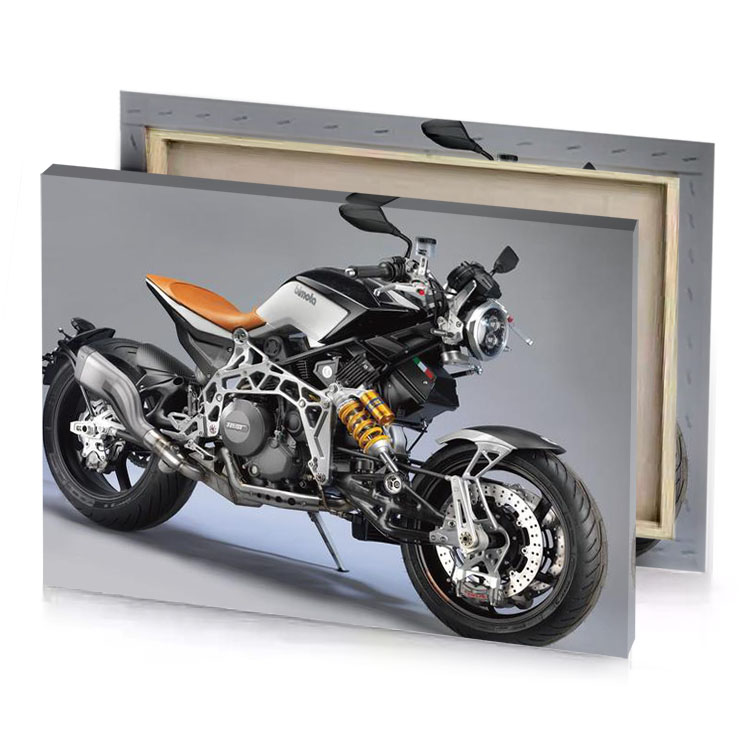 the motorcycle is parked on a gray surface smoky black canvas
