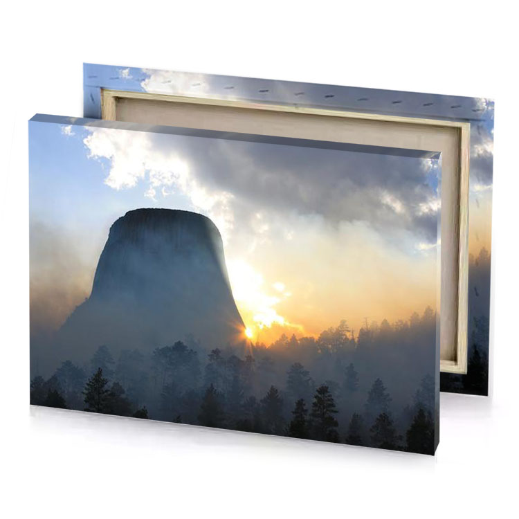 the sun is setting behind devils champagne canvas