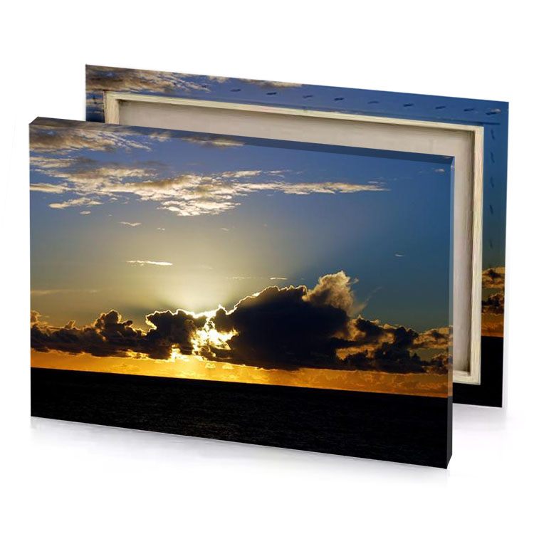 the sun is shining through clouds over ocean tan canvas
