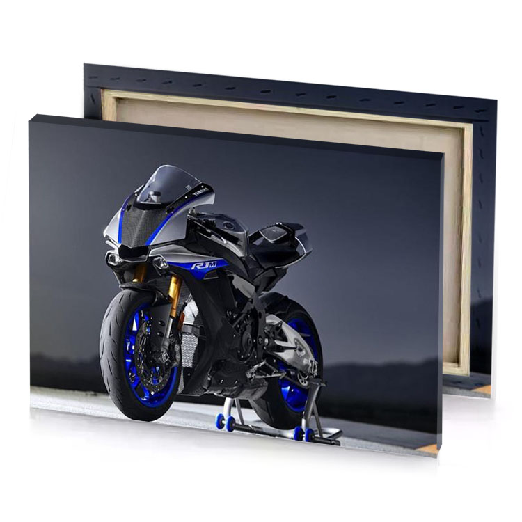 the yamaha r1 is shown in a dark background smoky black canvas
