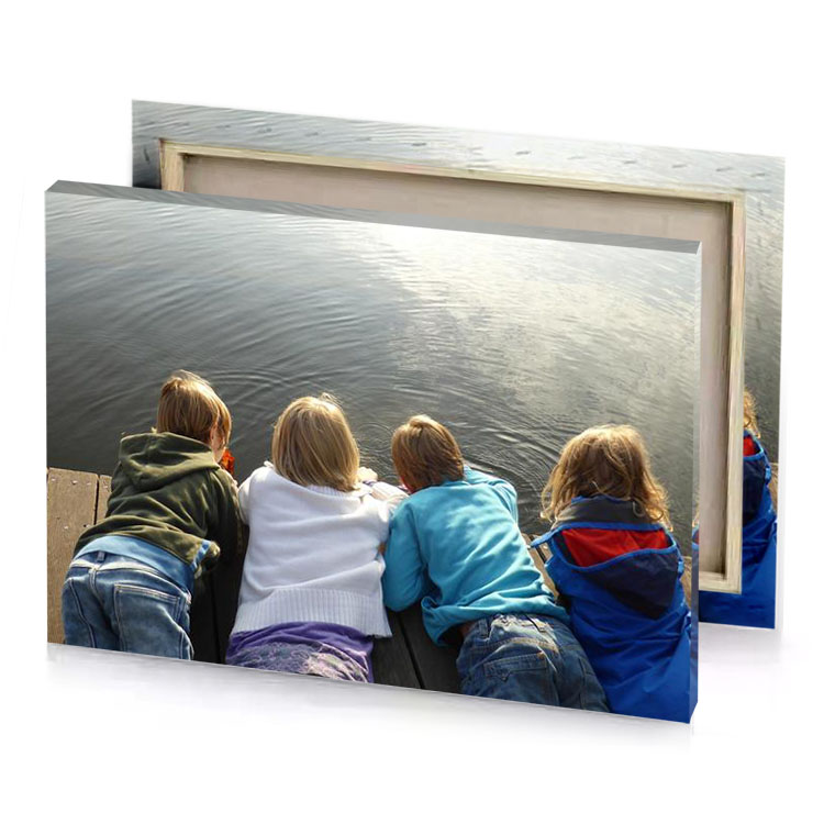 three children sitting on a dock looking at the water teal blue canvas