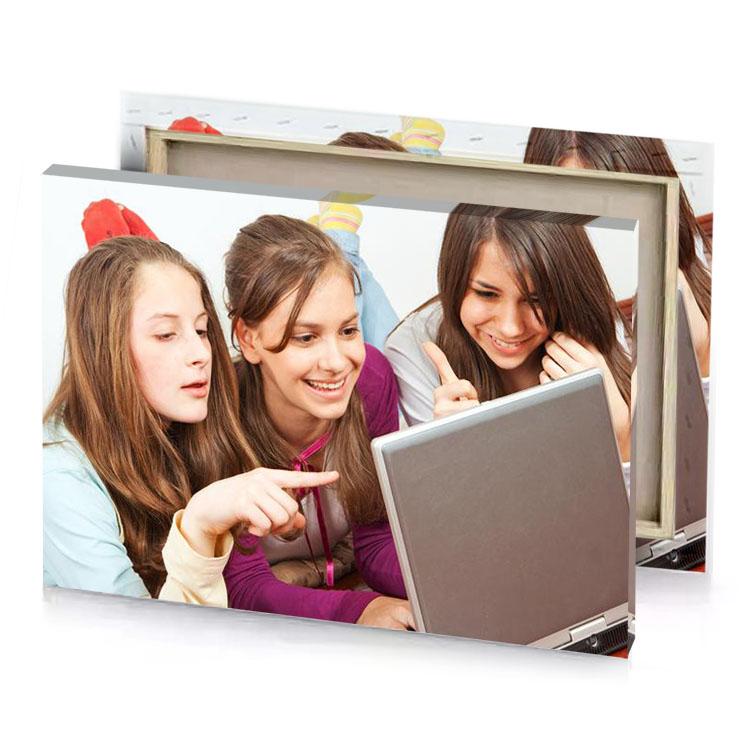 three girls looking at a laptop white smoke canvas