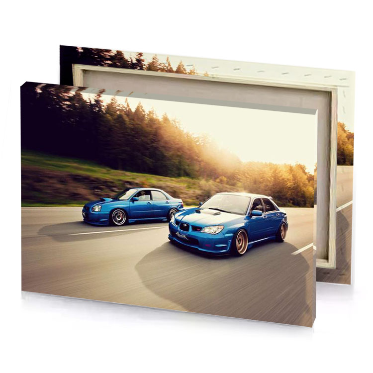 two cars driving down a road copper canvas