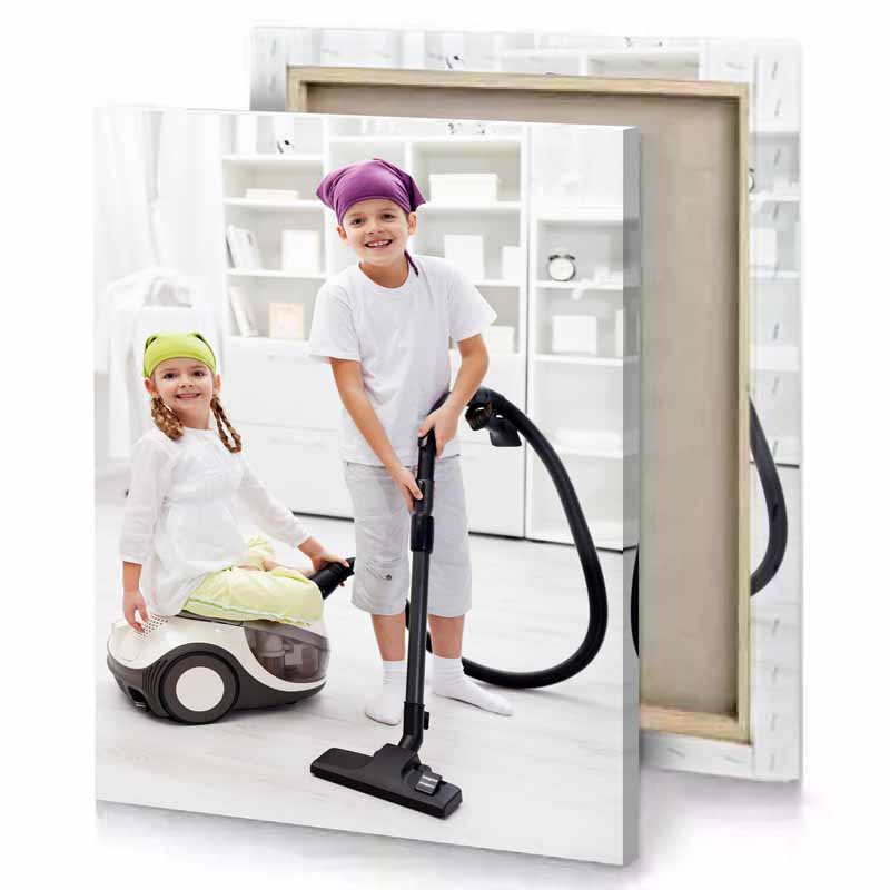 two children are playing with a vacuum platinum canvas