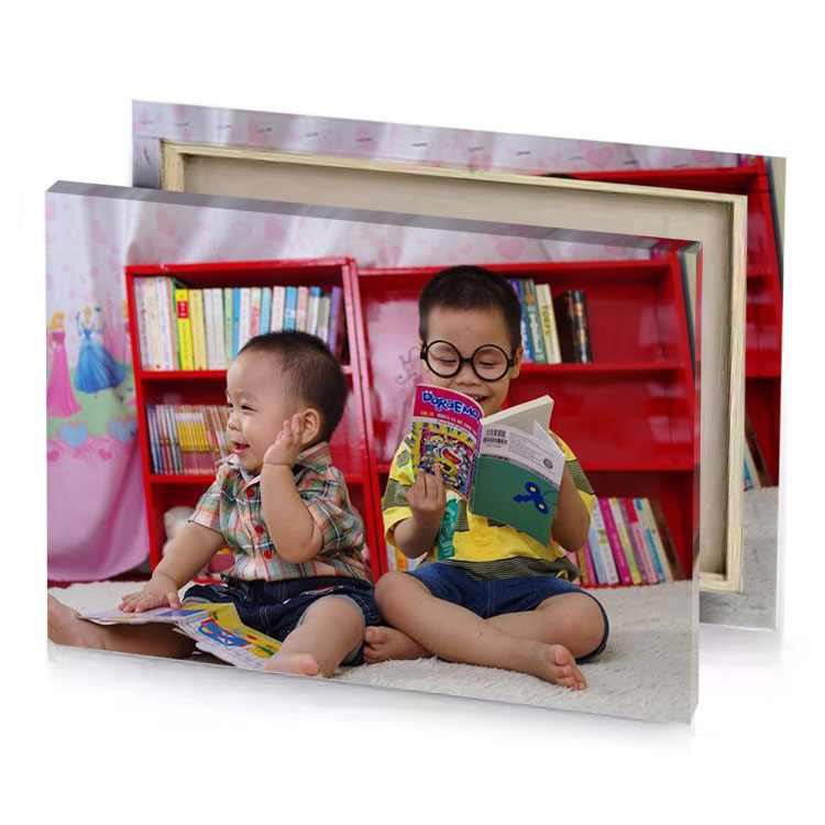 two children sitting on the floor reading books burgundy canvas