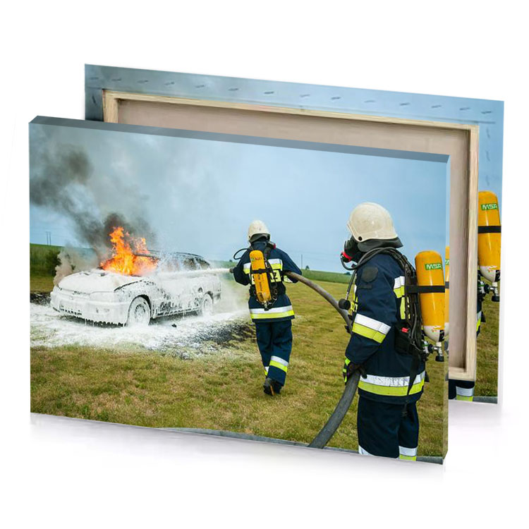 two firefighters in blue uniforms are putting a car on light canvas