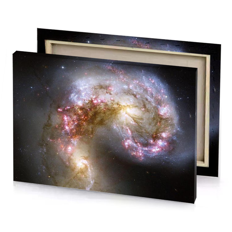 two galaxies one with a spiral shape and the other sepia canvas
