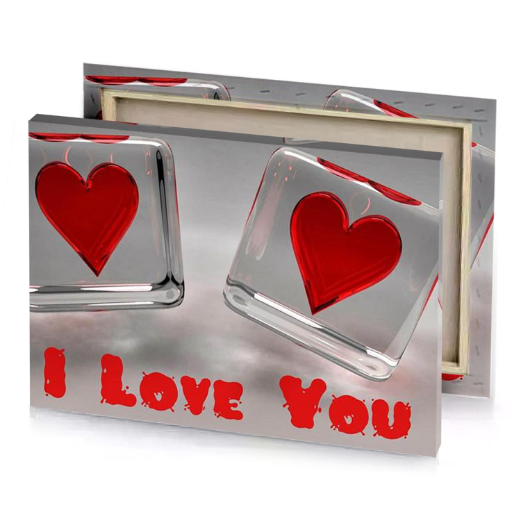 two glass cubes with a red heart on them dark canvas
