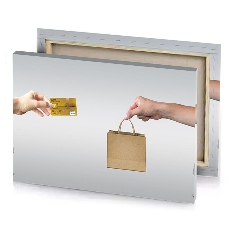 two hands holding a credit card and computer screen dark khaki canvas