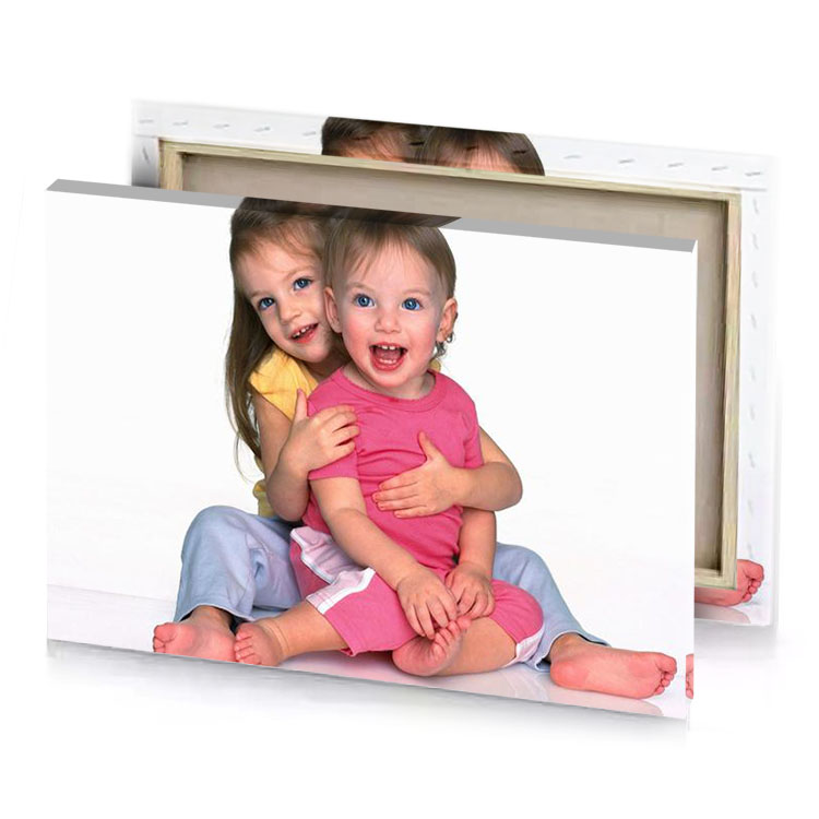 two little girls sitting on the floor snow canvas