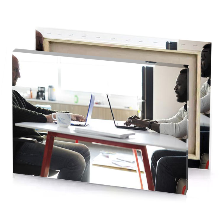 two men sitting at a table with laptops white smoke canvas