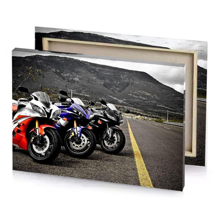 two motorcycles parked on the side of a road dim gray canvas