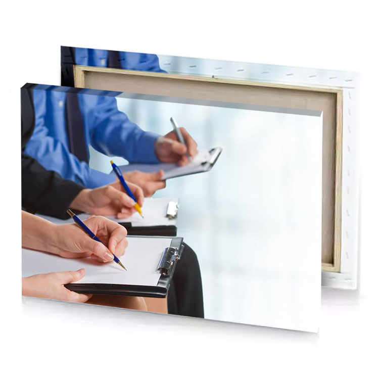 two people are writing on a piece of paper platinum canvas