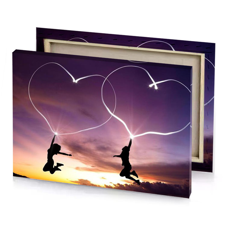 two people jumping in the air with hearts drawn on rosy brown canvas