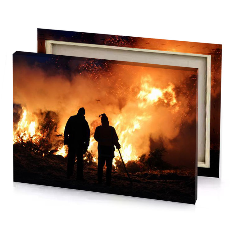 two people standing in front of a fire bronze canvas