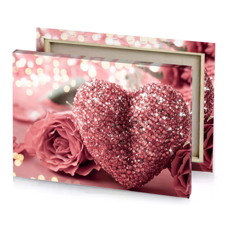 two pink roses and a heart shaped glitter garnet canvas