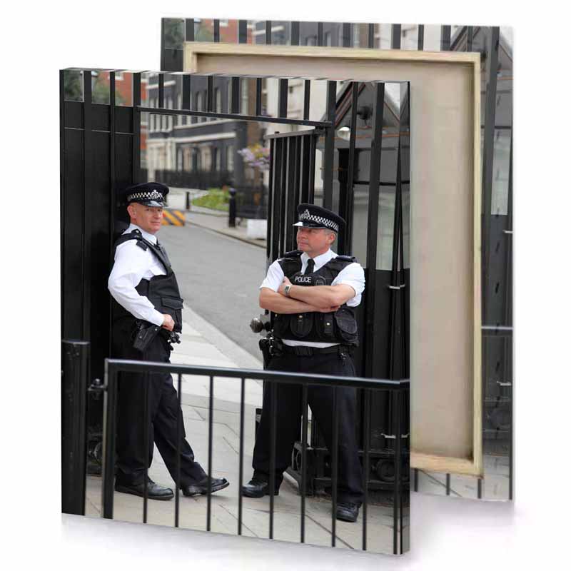 two police officers standing on a sidewalk smoky black canvas