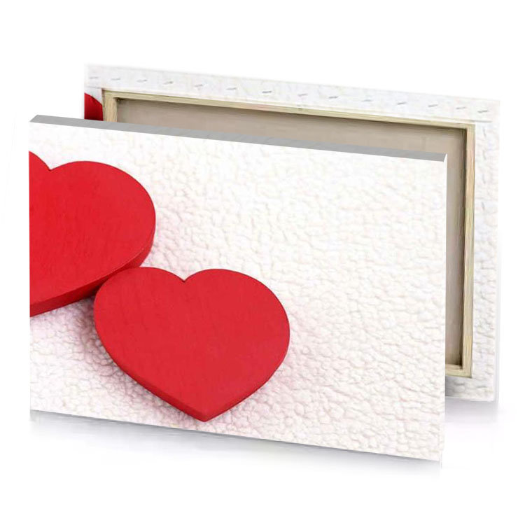 two red hearts on a white background crimson canvas