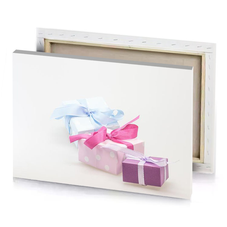 two small boxes with pink and blue bows hot canvas