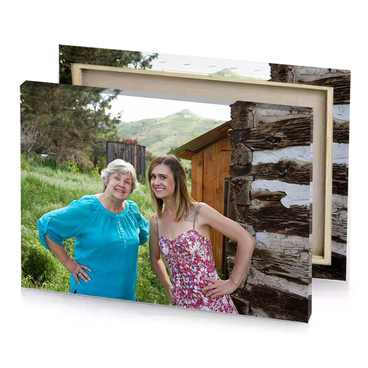 two women standing in front of a log cabin fern green canvas