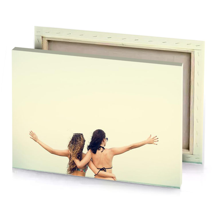 two women standing on the beach burlywood canvas